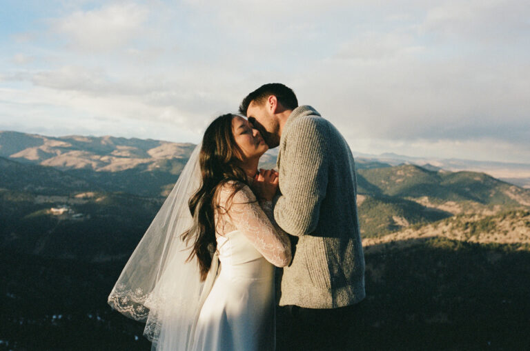 Bride and groom on a Colorado mountain taken on 35mm film
