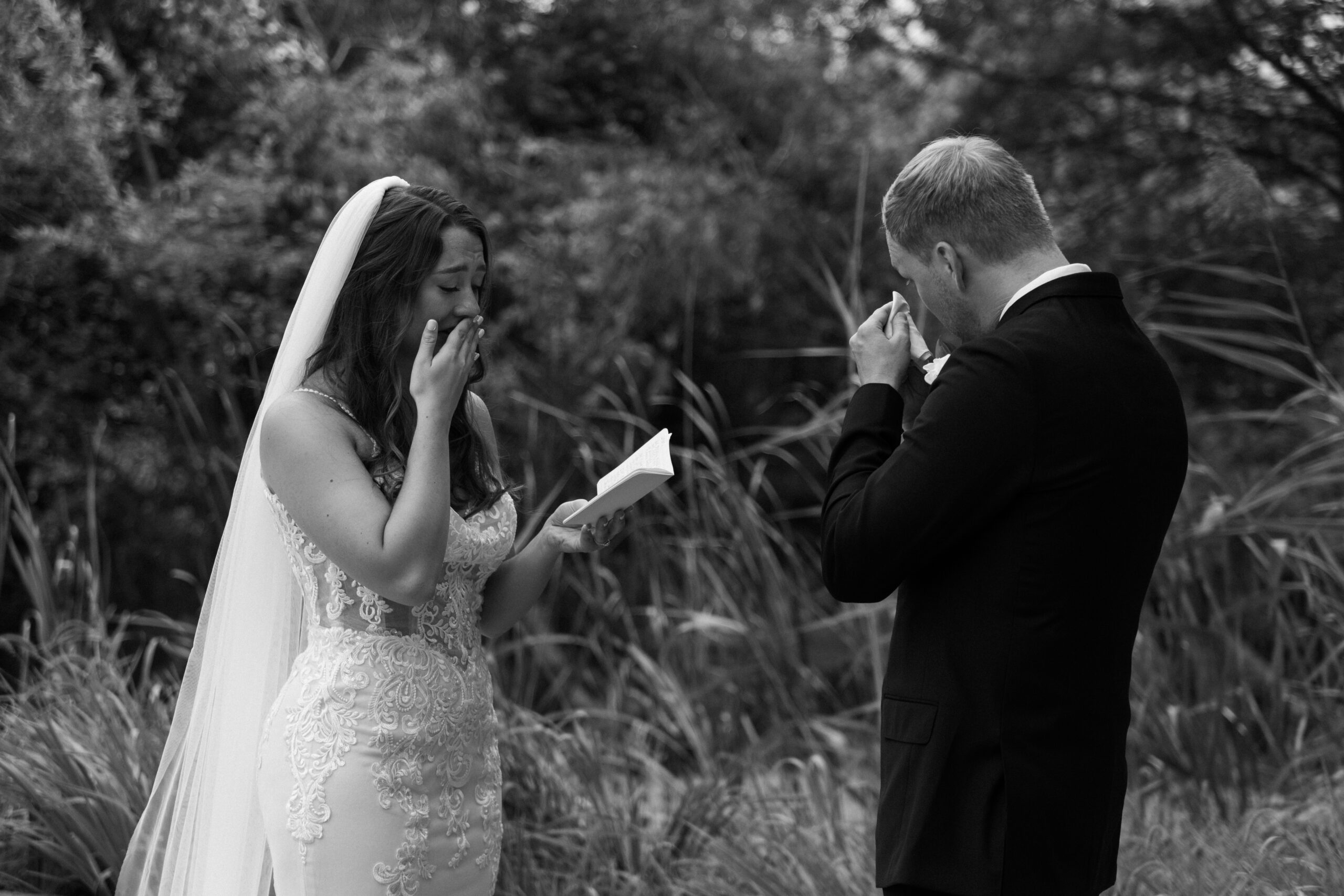 private vows shared between bride and groom as they wipe away tears before their wedding ceremony
